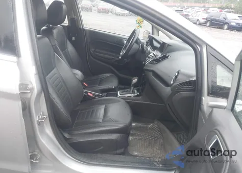 2014 Ford Fiesta Titanium z USA, uszkodzony, nr VIN 3FADP4CJ1EM206947